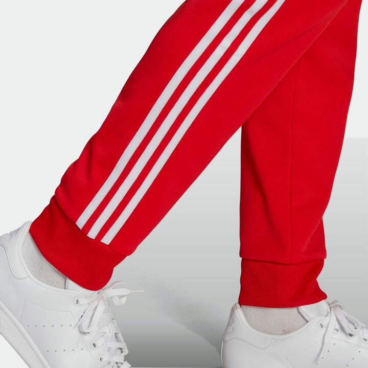 楽天市場 公式 アディダス Adidas 返品可 アディカラー クラシック Primeblue Sst トラックパンツ ジャージ オリジナルス レディース メンズ ウェア 服 ボトムス ジャージ パンツ 赤 レッド H 下 Adidas Online Shop 楽天市場店