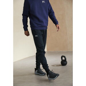 A_[A[}[ Y T_ V[Y RIVAL - Tracksuit bottoms - black/white