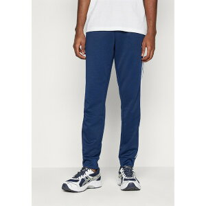 AfB_XIWiX Y JWApc {gX ADICOLOR CLASSICS SUPERSTAR TRACK PANTS - Tracksuit bottoms - night indigo