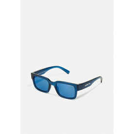 アーネット レディース サングラス＆アイウェア アクセサリー BIGFLIP UNISEX - Sunglasses - transparent blue/blue mirror blue