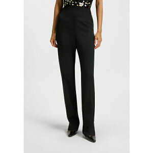 {X fB[X JWApc {gX TANJANA - Trousers - black one