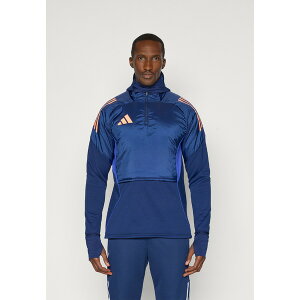 �A�f�B�_�X �����Y �W���P�b�g���u���]�� �A�E�^�[ TIRO25 COMPETITION WINTERIZED TOP - Outdoor jacket - dark blue/beam orange