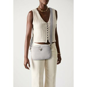 QX fB[X V_[obO obO MERIDIAN II CAMERA BAG - Cross body bag - ivory