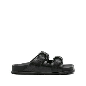 �}���[�� �Z�� �����Y �T���_�� �V���[�Y Moonogram-embossed leather slides Black