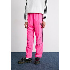 AfB_XIWiX Y T_ V[Y TEAMGEIST - Tracksuit bottoms - lucid pink/black