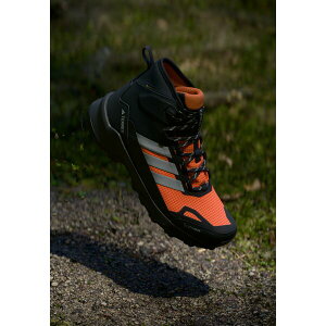 AfB_X ebNX Y u[c V[Y SKYCHASER AX5 MID GTX CLIMA - Winter boots - core black/matte silver/semi impact orange