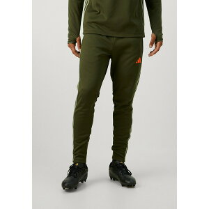 �A�f�B�_�X �����Y �J�W���A���p���c �{�g���X TIRO25 ESSENTIALS WINTERIZED TRAINING PANTS - Tracksuit bottoms - night cargo/tent green/impact orange