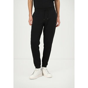 g~[qtBK[ Y T_ V[Y SLIM FLAG - Tracksuit bottoms - black