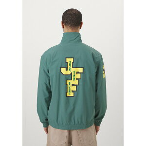 AfB_XIWiX Y T_ V[Y JAMAICA TRACK - Training jacket - tech emerald