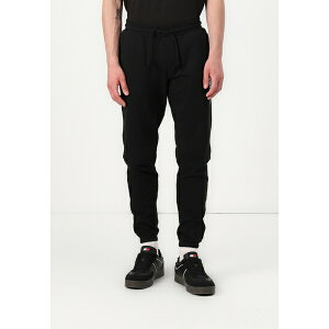 g~[qtBK[ Y T_ V[Y SLIM PANT - Tracksuit bottoms - black