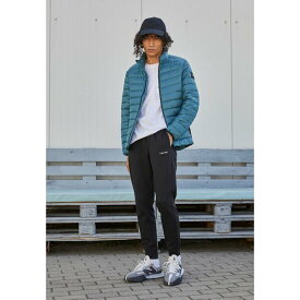 カルバンクライン メンズ カジュアルパンツ ボトムス MICRO LOGO - Tracksuit bottoms - black