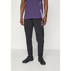 �A�f�B�_�X �����Y �J�W���A���p���c �{�g���X MANCHESTER UNITED TIRO25 COMPETITION VIS TECH TRAVEL PANT - Club wear - black/purple rush