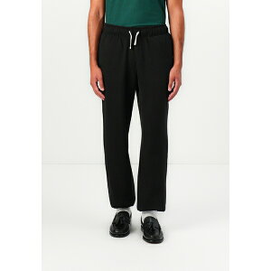 g~[ qtBK[ Y T_ V[Y ESSENTIAL - Tracksuit bottoms - black