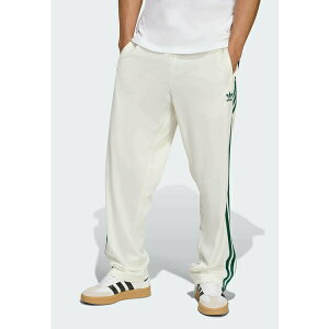 AfB_XIWiX Y T_ V[Y FIREBIRD - Tracksuit bottoms - off white collegiate green