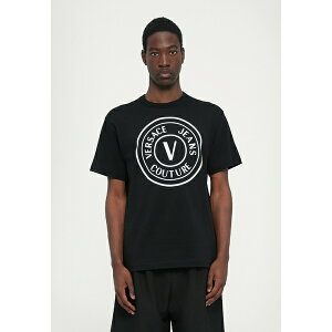 xT[` Y T_ V[Y EMBLEM FLOCK - Print T-shirt - black
