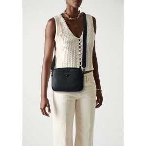 QX fB[X V_[obO obO MERIDIAN CAMERA BAG - Cross body bag - black