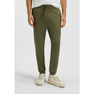 {X Y T_ V[Y SESTART - Tracksuit bottoms - open green two