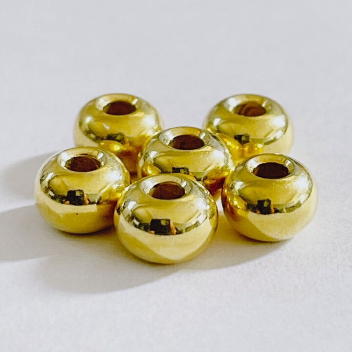 楽天市場】K18全金ビーズL(横5.5ミリ×高さ3.8ミリ渦無し)1粒売り 