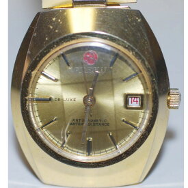 【中古】本物ATEKUアテクの紳士用金色メタル素材のごついラドーのような形の時計　〇A16-75-1　T-1