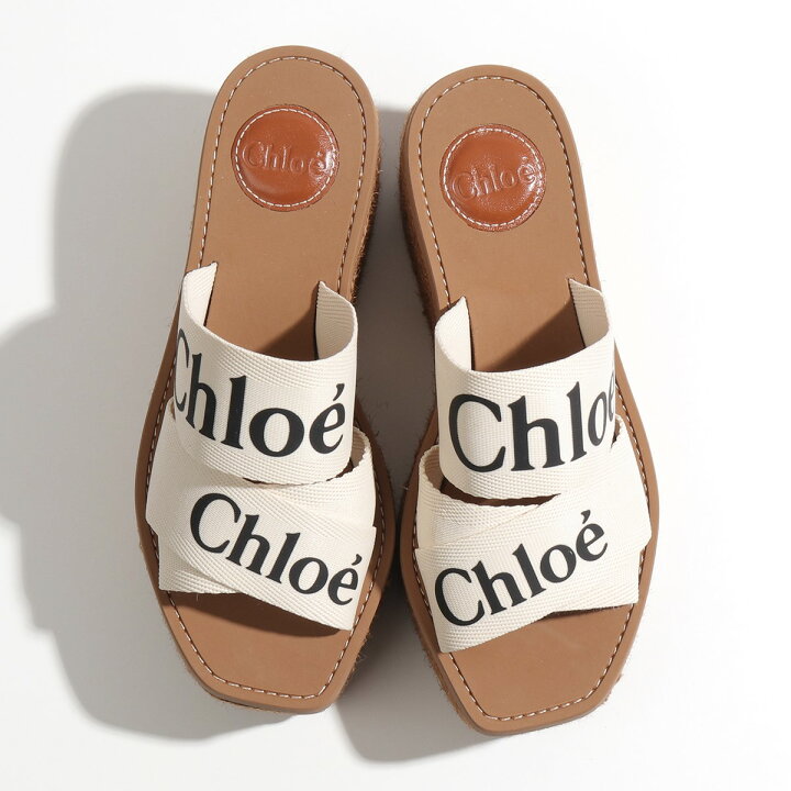 楽天市場】Chloe クロエ CHC21U44908 WOODY ウッディ ウェッジミュール サンダル 厚底 ロゴバンド プラットフォーム エスパドリーユ ジュート 靴 101/White レディース : インポートセレクト musee 楽天市場】Chloe クロエ CHC21U44908 WOODY ウッディ ウェッジミュール サンダル 厚底 ロゴバンド プラットフォーム エスパドリーユ ジュート 靴 101/White レディース : インポートセレクト musee