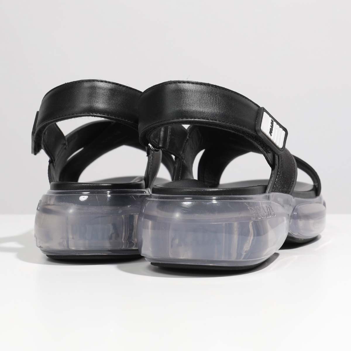 PRADA プラダ 1X516L 3KXW F0002/NERO ロゴ クロスベルト クリアソール サンダル ベルクロストラップ コンフォート 靴  レディース | インポートセレクト musee