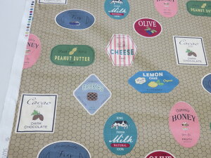 小関鈴子 ラベル柄 ヘキサゴン d ブラウン チンツ加工シャーティング生地 【メール便3m可】 生地 布地 服地 コットン パッチワーク 有輪 YUWA ユーワ