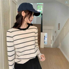 ニット トップス 七分丈 2024 秋 韓国 新型 丸 首 カバーの 頭は 色の ストライプに ぶつかります。