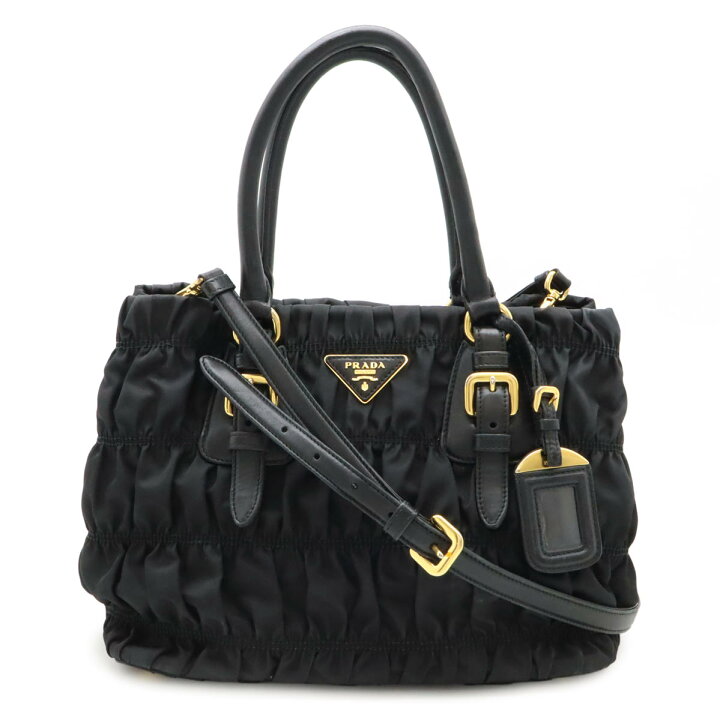 PRADA ハトメ 黒 レザー バッグ パンチング シルバー金具 楽天市場  