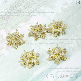 ネイルアクセサリー レディース 回転雪の花 お守りビーズ 二層高速回転 純金素材 耐久性 ジルコニア装飾 ラッキーアイテム 冬向け かわいいデザイン 高級感 軽量 接触冷感