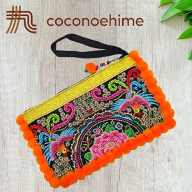 色鮮やかな刺繍のポンポンポーチ☆オレンジカラーモン族 刺繍 フラワー刺繍 チョウ刺繍 ポンポン ポーチ　バッグ 小物入れ 撮影 小道具 普段使い プレゼント カラフル ラッキーカラー 色鮮やか 美しい 可愛い ファッション エスニック アジアン雑貨 輸入雑貨