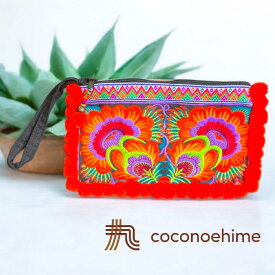 色鮮やかな刺繍のポンポンポーチ☆蛍光オレンジカラーモン族 刺繍 フラワー刺繍 チョウ刺繍 ポンポン ポーチ　バッグ 小物入れ 撮影 小道具 普段使い プレゼント カラフル ラッキーカラー 色鮮やか 美しい 可愛い ファッション エスニック アジアン雑貨 輸入雑貨