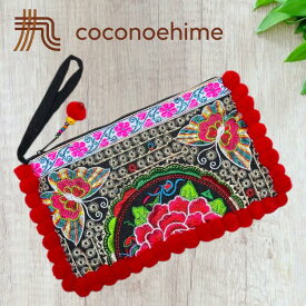 色鮮やかな刺繍のポンポンポーチ☆レッドカラーモン族 刺繍 フラワー刺繍 チョウ刺繍 ポンポン ポーチ　バッグ 小物入れ 撮影 小道具 普段使い プレゼント カラフル ラッキーカラー 色鮮やか 美しい 可愛い ファッション エスニック アジアン雑貨 輸入雑貨
