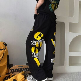 ワイドパンツ ジャージパンツ ロゴプリント バックプリント ビッグロゴ 黒 黄色 ストレッチ ダンス 衣装 ヒップホップ コスチューム 韓国ファッション 大きいサイズ 個性的 派手 パンツ