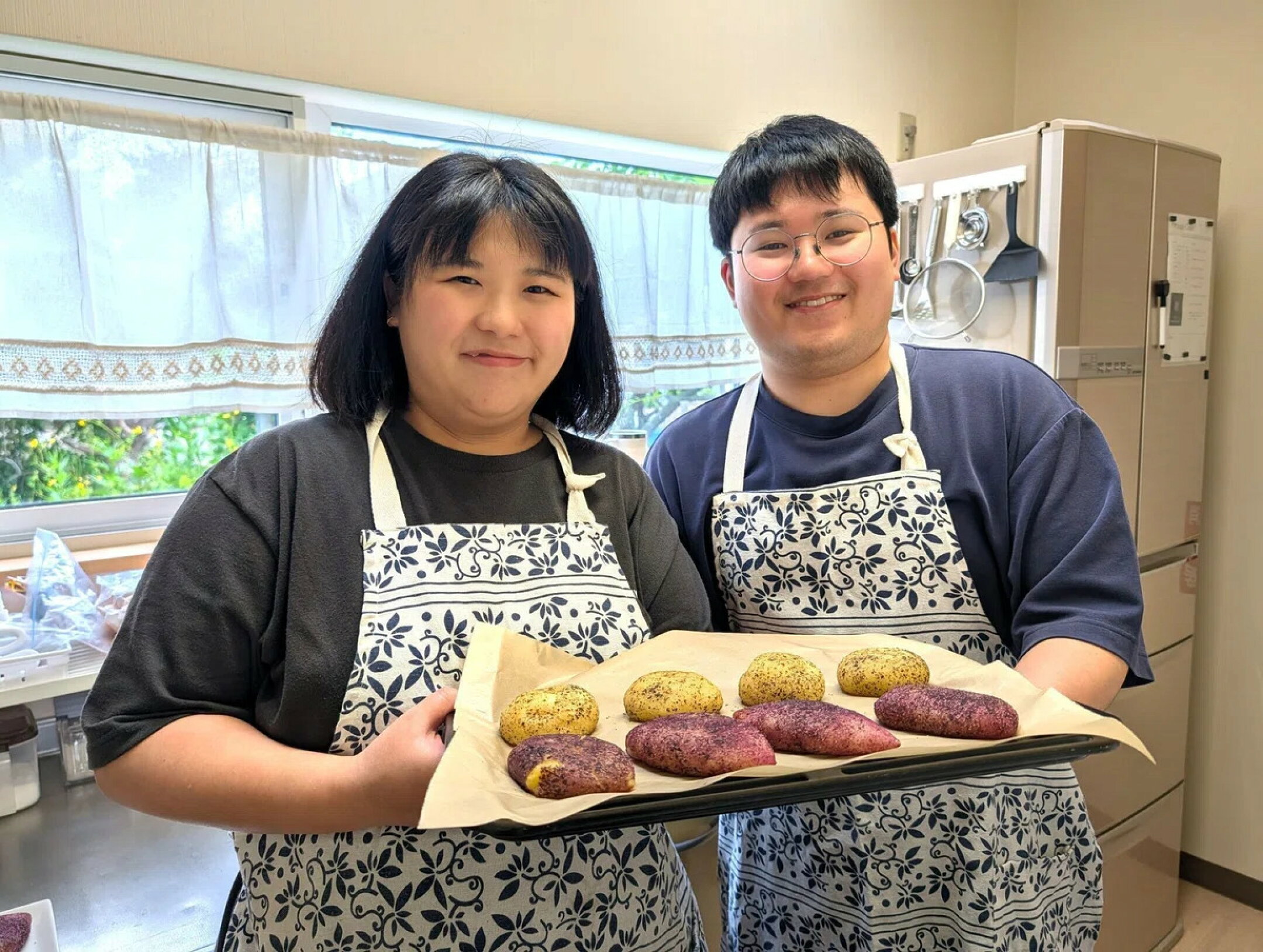 えるパンの工房を訪問しました。 写真はチョー・ヨンジュさんと夫のジョン・ウジンさん。