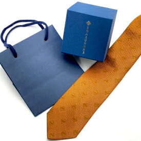 【ふるさと納税】SHAKUNONE　ベーシックロゴネクタイ　金茶色_ ネクタイ ロゴ入り ビジネス小物 ビジネス スーツ メンズファッション メンズ 紳士 男性用 金茶色 シルク SILK シルクネクタイ 贈答 ギフト プレゼント 岡山県 津山市 送料無料 【1254630】