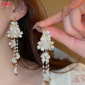 イヤリング レディース アクセサリー 花 タッセル 揺れる 耳飾り 高級感 フェアリースタイル 優しい 華やか 繊細 デザイン 耳元 おしゃれ 普段使い デート パーティー 結婚式 お呼ばれ ギフト プレゼント ジュエリー ゴールド系 エレガント 上品