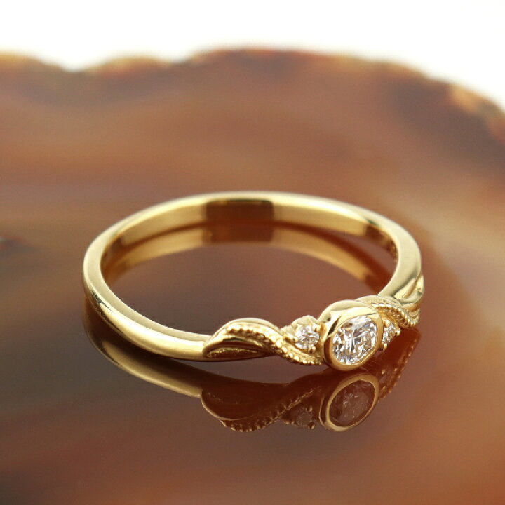 ▽ えッ 天然ダイヤモンドリングk18 ウェーブラインリング 