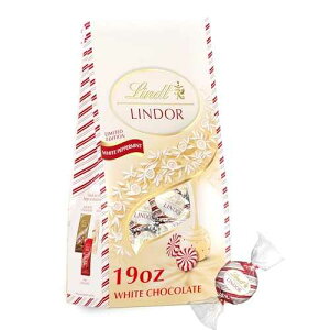 Lindt LINDOR �z���f�[ �y�p�[�~���g �z���C�g �`���R���[�g �g�����t �o�b�O�A19.0 �I���X (2021�N) Lindt LINDOR White Chocolate Peppermint Candy Truffles with Smooth Peppermint Truffle Center, 19 oz. Bag