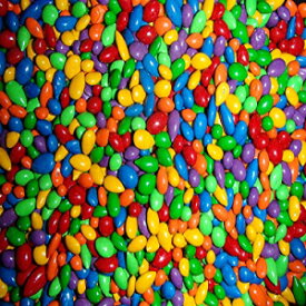 CandyKorner Sunbursts - 虹色のチョコレートで覆われたヒマワリの種 1 ポンド (16 オンス) CandyKorner Sunbursts - Rainbow Colored Chocolate Covered Sunflower Seeds 1 Pound ( 16 Ounces )