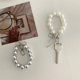 キーリング キーホルダー バッグ チャーム ミニチャーム ストラップ 韓国雑貨 カギ 鍵 パール リボン モチーフ 上品 おしゃれ かわいい ナスカン レディース プレゼント ギフト プチギフト 使いやすい キラキラ 【2カラー】