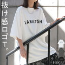 Tシャツ ロゴ レディース 【即納】 トップス 半袖 プリント カットソー ロング ティーシャツ チュニック ビッグ プラスサイズ クルーネック 長い ドルマン ドルマンスリーブ ゆったり 体型カバー お尻が隠れる 大きいサイズ おしゃれ 白 黒 秋 夏 HUG.U