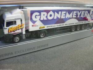 【送料無料】ホビー 模型車 車 レーシングカー oスーツケースセミトレーラ187 herpa man tga hertz gronemeyer 12 valisesemiremorque
