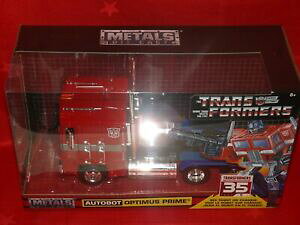 �y���������z�z�r�[�@�͌^�ԁ@�ԁ@���[�V���O�J�[ �g�����Xjada 124 transformers autobot optimus prime 99524