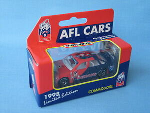 【送料無料】ホビー 模型車 車 レーシングカー マッチホールデンコモドールメルボルンデーモンオーストラリアサッカーモデルmatchbox holden commodore melbourne demons australian afl football jouet voitu