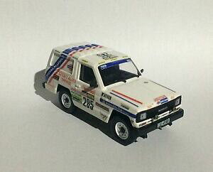 yzYpg[̃_J[̃nhCh́FNissan Patrol Dakar Handmade 1:43