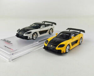 yzzr[ ͌^ fJ[ }c_o[WCG[zCgA~f164 mazda rx7 modified version yellowwhite alloy car model