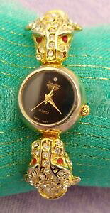 yzrv@p[N[XtXL[NX^Ip[hwbhVo[S[hP[ucCXgNH[cEHb`park lane~swarovski crystal leopard heads silver amp; gold cable twist q