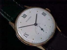 【送料無料】腕時計　シャープヴィンテージマンズソリッドピンクゴールドモバドクラシックサーキュラーsharp vintage mans 14 kt solid pink gold movado wristwatch classic circular