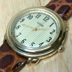 【送料無料】腕時計　ヴィンテージメンズゴールドトーンブラウンレザーアナログクォーツウォッチアワーバッテリーvintage guess mens gold tone brown leather analog quartz watch hours~ battery