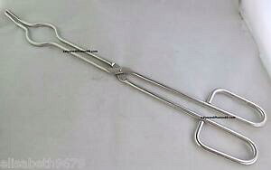 yzWG[EANZT[ oPcNvpince a tenir le creuset rond genre godet lors de la coulee des metaux en fusion